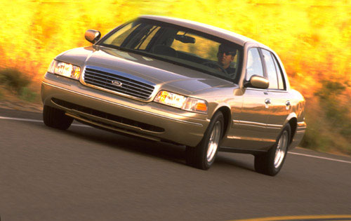 ford_crown_victoria_lx_sedan_gold_1999